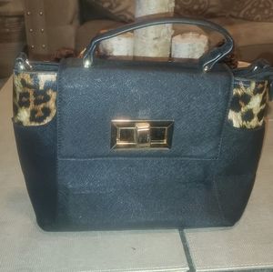Black purse with leopard sides no brand name